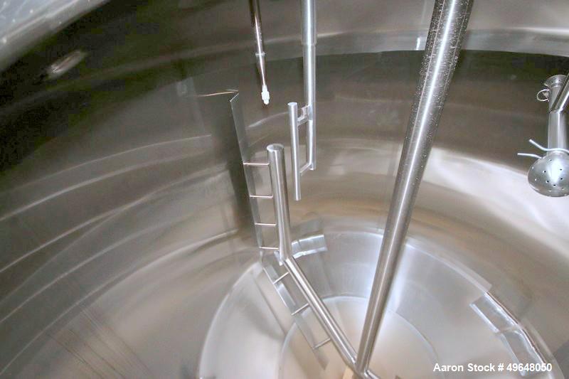 Used Feldmeier Stainless Steel Single Wall Mix Tank, Approximate 1,500 Gallon, Vertical. Internal Tank Dims.  Approx. 92" Tall x 72" Dia. Dished top, cone bottom. Top entering anchor style agitator. ...