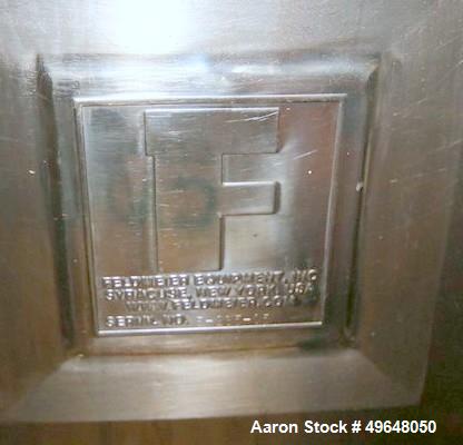 Used Feldmeier Stainless Steel Single Wall Mix Tank, Approximate 1,500 Gallon, Vertical. Internal Tank Dims.  Approx. 92" Tall x 72" Dia. Dished top, cone bottom. Top entering anchor style agitator. ...