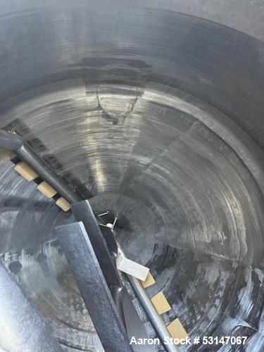 Used Feldmeier 1,700 Gallon 316 Stainless Steel Jacketed Tank. Double motion scraper agitation. Approximate 8' diameter X 4' straight side with approximate 45 degree cone bottom with 4" center bottom...