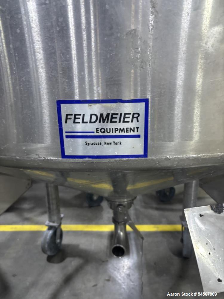 Used Tank, Feldmeier 1,000 Gallon, Stainless steel. Dish top, Cone Bottom, On casters with bottom discharge valve.