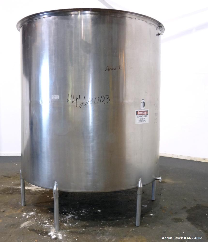Used Filpaco Tank, 2000 Gallons, 304 Stainless Steel, Vertical. 86” Diameter X 84” straight side, open top with (2) covers, cone bottom. Side bottom entering agitator with a (3) blade prop driven by ...