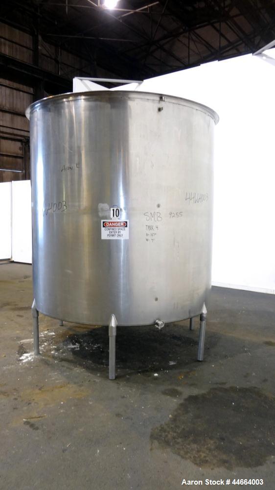 Used Filpaco Tank, 2000 Gallons, 304 Stainless Steel, Vertical. 86” Diameter X 84” straight side, open top with (2) covers, cone bottom. Side bottom entering agitator with a (3) blade prop driven by ...