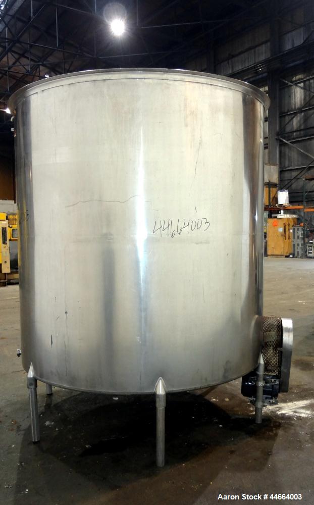 Used Filpaco Tank, 2000 Gallons, 304 Stainless Steel, Vertical. 86” Diameter X 84” straight side, open top with (2) covers, cone bottom. Side bottom entering agitator with a (3) blade prop driven by ...