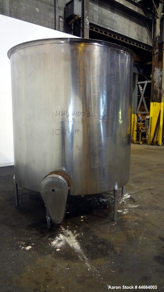 Used Filpaco Tank, 2000 Gallons, 304 Stainless Steel, Vertical. 86” Diameter X 84” straight side, open top with (2) covers, cone bottom. Side bottom entering agitator with a (3) blade prop driven by ...