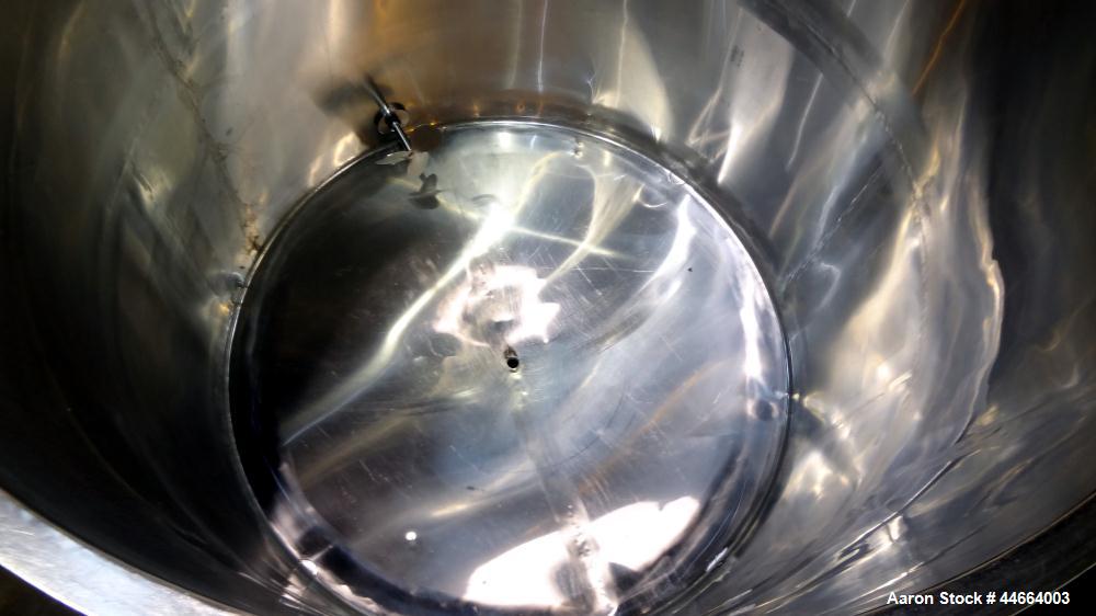 Used Filpaco Tank, 2000 Gallons, 304 Stainless Steel, Vertical. 86” Diameter X 84” straight side, open top with (2) covers, cone bottom. Side bottom entering agitator with a (3) blade prop driven by ...