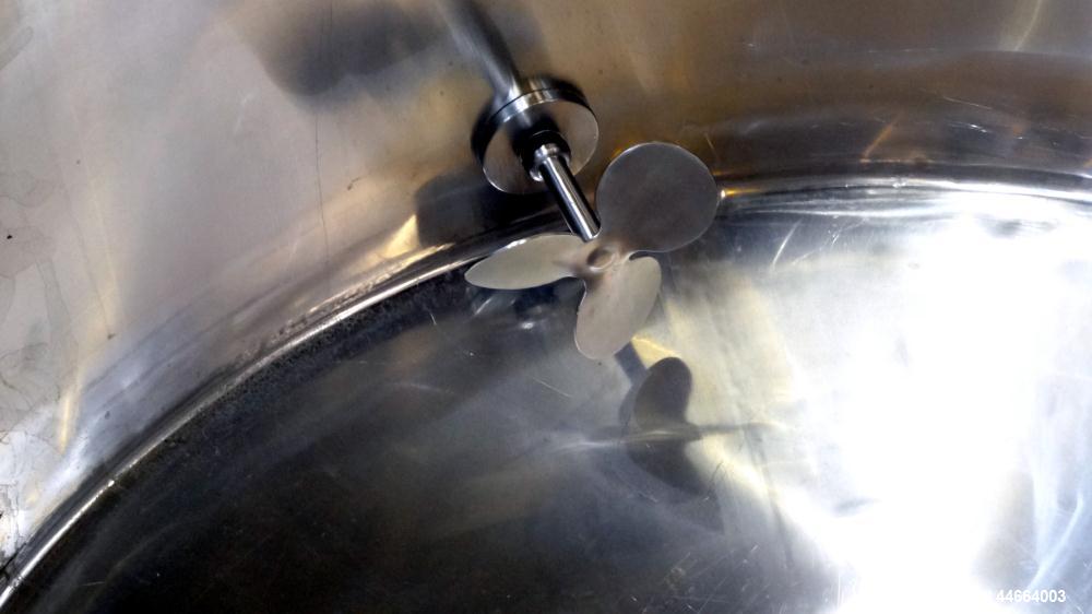 Used Filpaco Tank, 2000 Gallons, 304 Stainless Steel, Vertical. 86” Diameter X 84” straight side, open top with (2) covers, cone bottom. Side bottom entering agitator with a (3) blade prop driven by ...