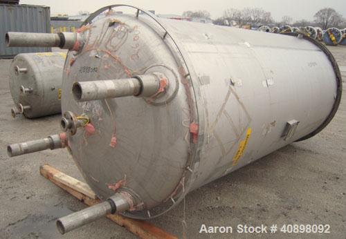 Used Four Corp Pressure Tank, 1200 Gallon, AL-6XN Superaustenitic Stainless Steel, Vertical. 56" diameter x 108" straight side, dished top and bottom. Internal rated 75/-15 psi at 302 deg F. Openings...