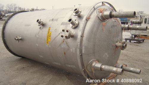 Used Four Corp Pressure Tank, 1200 Gallon, AL-6XN Superaustenitic Stainless Steel, Vertical. 56" diameter x 108" straight side, dished top and bottom. Internal rated 75/-15 psi at 302 deg F. Openings...