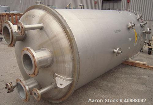 Used Four Corp Pressure Tank, 1200 Gallon, AL-6XN Superaustenitic Stainless Steel, Vertical. 56" diameter x 108" straight side, dished top and bottom. Internal rated 75/-15 psi at 302 deg F. Openings...