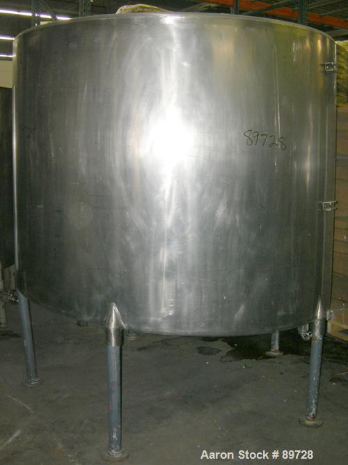 USED: G & F Manufacturing tank, 1000 gallon, 304 stainless steel, vertical. 74" diameter x 58" straight side, slight coned top, sloped bottom. Side bottom 3 blade agitator, driven by a 1 hp, 3/60/208...