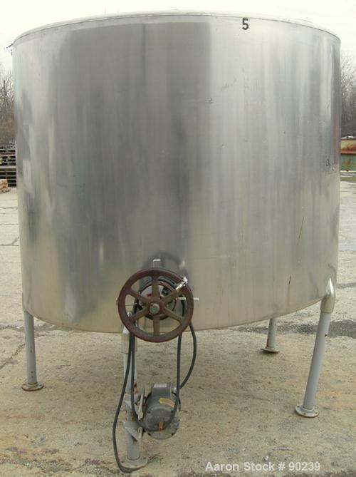 USED: G & F Manufacturing tank, 1000 gallon, 304 stainless steel, vertical. 74" diameter x 58" straight side, slight coned top, sloped bottom. Side bottom 3 blade agitator, driven by a 1 hp, 3/60/208...