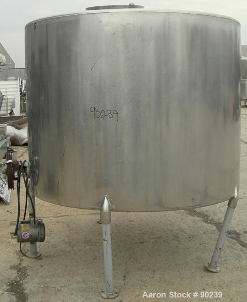 USED: G & F Manufacturing tank, 1000 gallon, 304 stainless steel, vertical. 74" diameter x 58" straight side, slight coned top, sloped bottom. Side bottom 3 blade agitator, driven by a 1 hp, 3/60/208...
