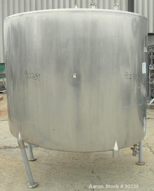 USED: G & F Manufacturing tank, 1000 gallon, 304 stainless steel, vertical. 74" diameter x 58" straight side, slight coned top, sloped bottom. Side bottom 3 blade agitator, driven by a 1 hp, 3/60/208...