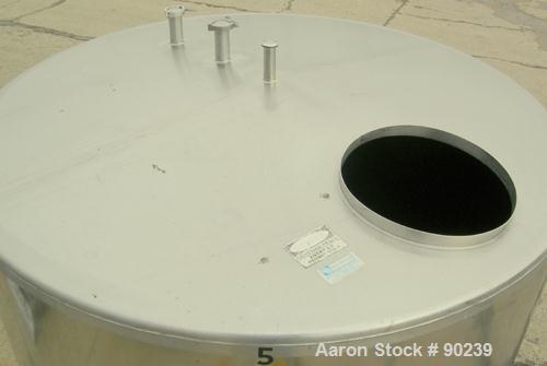 USED: G & F Manufacturing tank, 1000 gallon, 304 stainless steel, vertical. 74" diameter x 58" straight side, slight coned top, sloped bottom. Side bottom 3 blade agitator, driven by a 1 hp, 3/60/208...