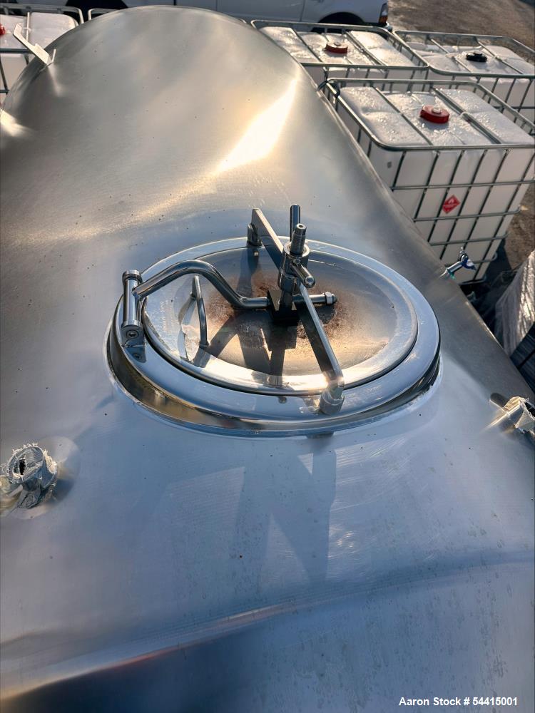 Used Glacier Tanks Stainless Steel Brew Tank, 40 BBL (1,240 Gallon). 304 stainless steel. Cone bottom. Center bottom outlet. Side manway. On (4) legs. SN GT-V-3215.
