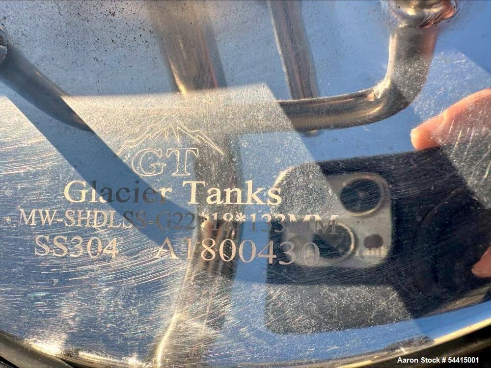Used Glacier Tanks Stainless Steel Brew Tank, 40 BBL (1,240 Gallon). 304 stainless steel. Cone bottom. Center bottom outlet. Side manway. On (4) legs. SN GT-V-3215.