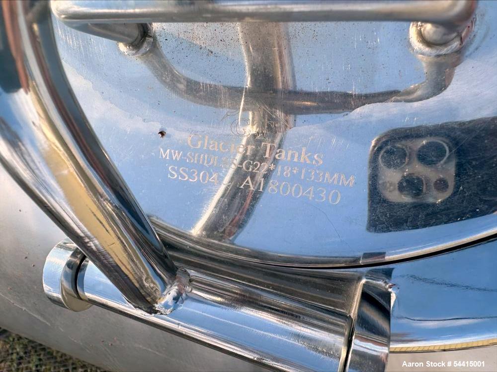 Used Glacier Tanks Stainless Steel Brew Tank, 40 BBL (1,240 Gallon). 304 stainless steel. Cone bottom. Center bottom outlet. Side manway. On (4) legs. SN GT-V-3215.