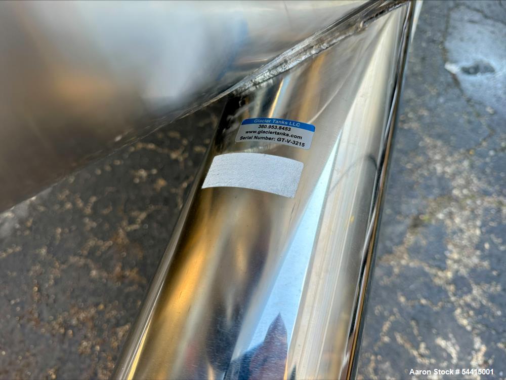 Used Glacier Tanks Stainless Steel Brew Tank, 40 BBL (1,240 Gallon). 304 stainless steel. Cone bottom. Center bottom outlet. Side manway. On (4) legs. SN GT-V-3215.