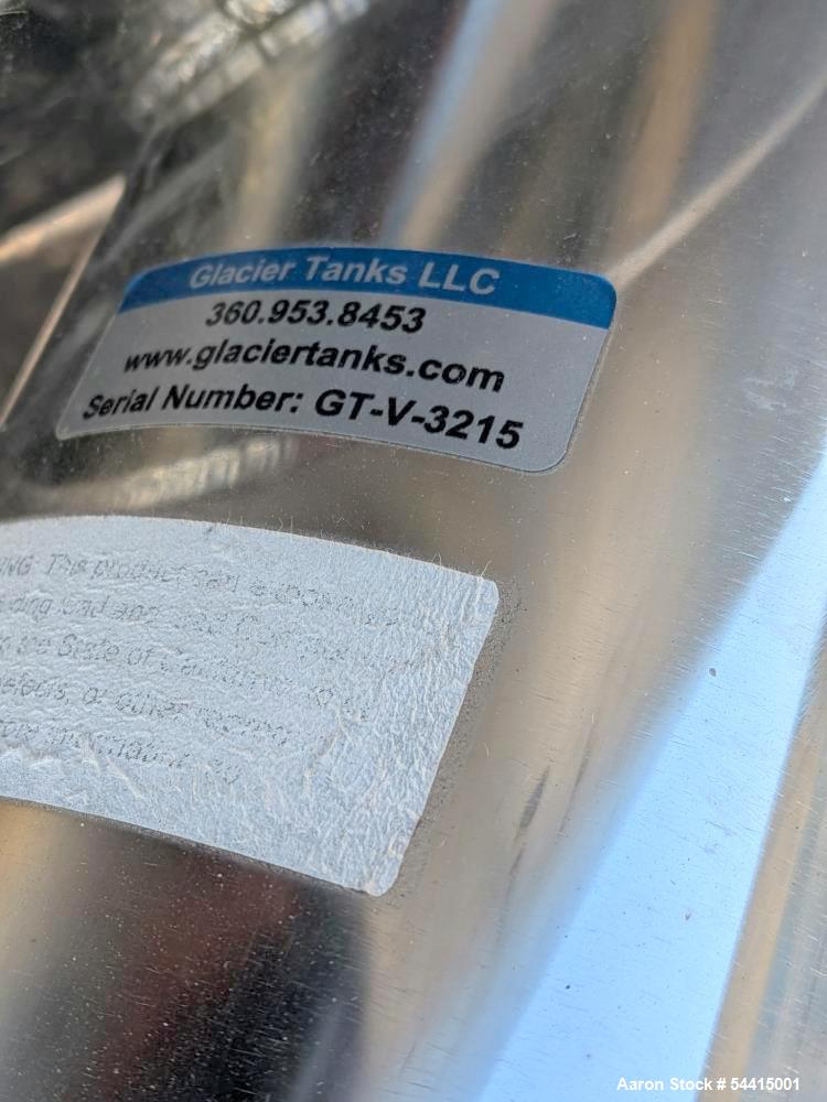 Used Glacier Tanks Stainless Steel Brew Tank, 40 BBL (1,240 Gallon). 304 stainless steel. Cone bottom. Center bottom outlet. Side manway. On (4) legs. SN GT-V-3215.