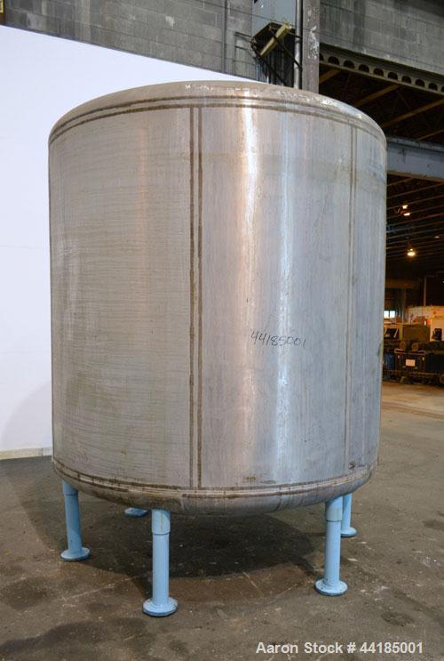 Used Groen Tank, 2500 Gallons, 304 Stainless Steel, Vertical. 90” Diameter x 78” straight side, dished top and bottom. Openings top (2) 1-5/8” threaded, 2-1/2” threaded, 15-3/4” man way with cover. 2...