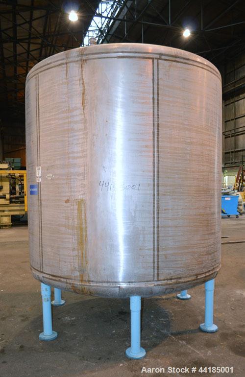 Used Groen Tank, 2500 Gallons, 304 Stainless Steel, Vertical. 90” Diameter x 78” straight side, dished top and bottom. Openings top (2) 1-5/8” threaded, 2-1/2” threaded, 15-3/4” man way with cover. 2...