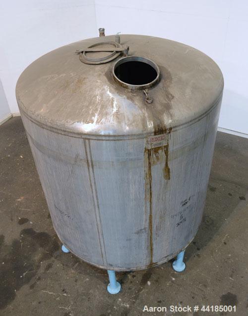 Used Groen Tank, 2500 Gallons, 304 Stainless Steel, Vertical. 90” Diameter x 78” straight side, dished top and bottom. Openings top (2) 1-5/8” threaded, 2-1/2” threaded, 15-3/4” man way with cover. 2...