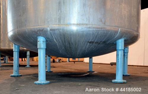 Used Groen Tank, 2500 Gallons, 304 Stainless Steel, Vertical. 90” Diameter x 78” straight side, dished top and bottom. Openings: top (2) 1-5/8” threaded, 2-1/2” threaded, 15-3/4” manway with cover; 2...
