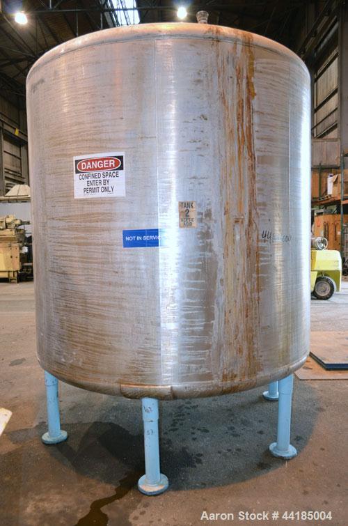 Used Groen Tank, 2500 Gallons, 304 Stainless Steel, Vertical. 90” Diameter x 78” straight side, dished top and bottom. Openings top (2) 1-5/8” threaded, 2-1/2” threaded, 15-3/4” man way with cover. 2...