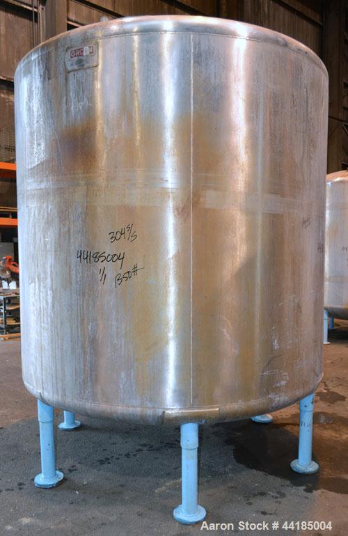 Used Groen Tank, 2500 Gallons, 304 Stainless Steel, Vertical. 90” Diameter x 78” straight side, dished top and bottom. Openings top (2) 1-5/8” threaded, 2-1/2” threaded, 15-3/4” man way with cover. 2...