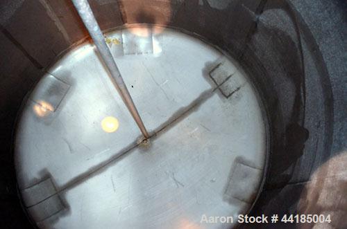 Used Groen Tank, 2500 Gallons, 304 Stainless Steel, Vertical. 90” Diameter x 78” straight side, dished top and bottom. Openings top (2) 1-5/8” threaded, 2-1/2” threaded, 15-3/4” man way with cover. 2...