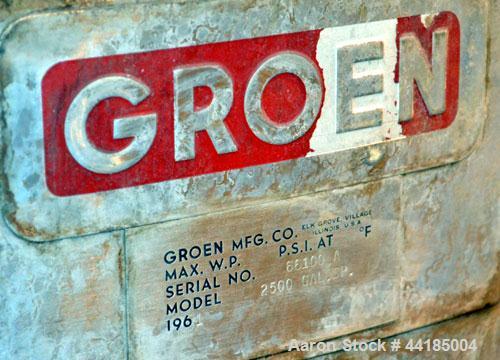 Used Groen Tank, 2500 Gallons, 304 Stainless Steel, Vertical. 90” Diameter x 78” straight side, dished top and bottom. Openings top (2) 1-5/8” threaded, 2-1/2” threaded, 15-3/4” man way with cover. 2...