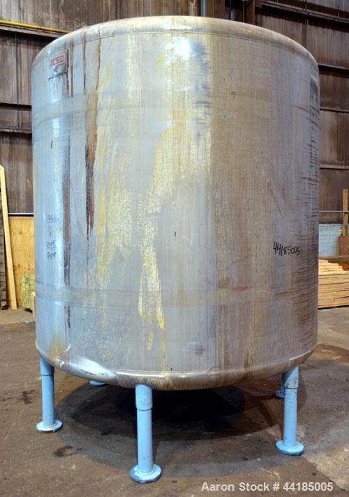 Used Groen Tank, 2500 Gallons, 304 Stainless Steel, Vertical. 90” Diameter x 78” straight side, dished top and bottom. Openings: top (2) 1-5/8” threaded, 2-1/2” threaded, 15-3/4” manway with cover; 2...