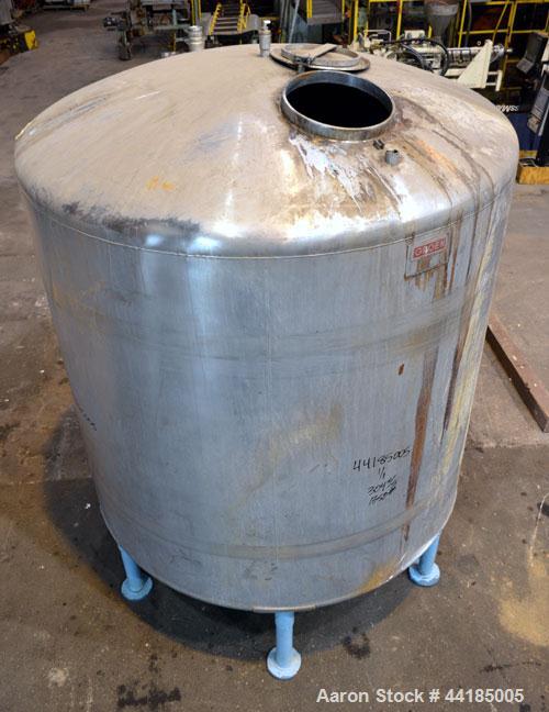 Used Groen Tank, 2500 Gallons, 304 Stainless Steel, Vertical. 90” Diameter x 78” straight side, dished top and bottom. Openings: top (2) 1-5/8” threaded, 2-1/2” threaded, 15-3/4” manway with cover; 2...