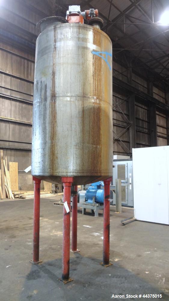 Used Imperial Steel Tank, 1200 Gallon, 316 Stainless Steel, Vertical. Approximate 60" diameter x 96" straight side, dished top and bottom. Top entering ProQuip agitator, no model or serial#. Approxim...
