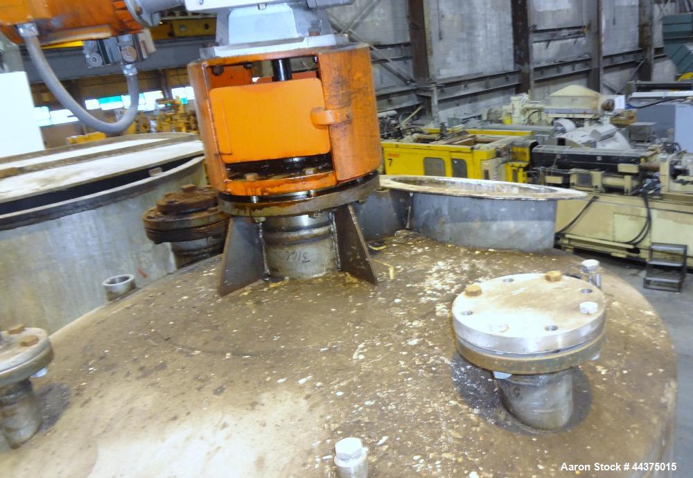 Used Imperial Steel Tank, 1200 Gallon, 316 Stainless Steel, Vertical. Approximate 60" diameter x 96" straight side, dished top and bottom. Top entering ProQuip agitator, no model or serial#. Approxim...