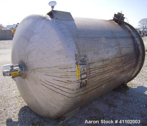 Used Imperial Steel Tank Company Tank, 1800 gallon, 304 stainless steel, vertical. 72" diameter x 96" straight side. Flat bolt on top with a 1/4 hinged cover, dish bottom. Top carbon steel agitator b...