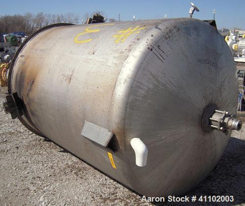 Used Imperial Steel Tank Company Tank, 1800 gallon, 304 stainless steel, vertical. 72" diameter x 96" straight side. Flat bolt on top with a 1/4 hinged cover, dish bottom. Top carbon steel agitator b...