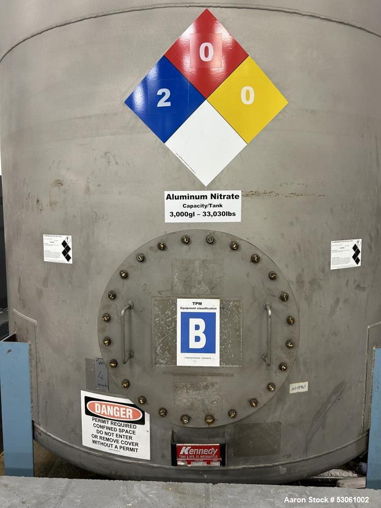 Used 3,000 Gallon Kennedy Holding Tank, Approx. 153" straight side, 84" diameter,Approx 183" overall height. Various top openings, 20" side bottom bolted manyway entrance, 3" center bottom outlet w/ ...