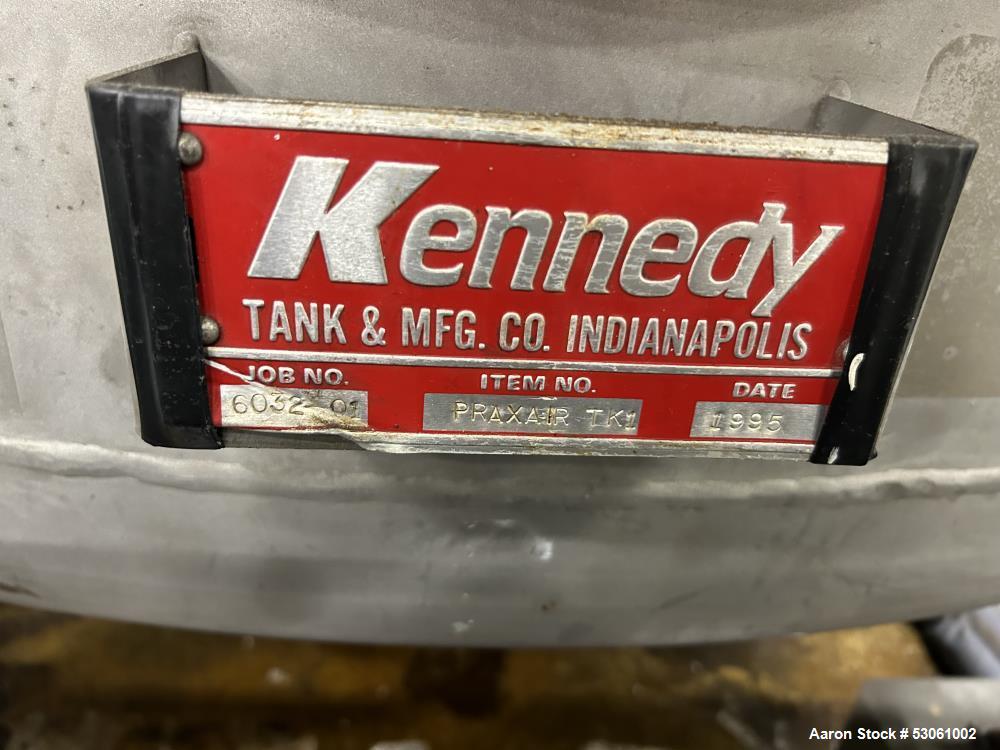 Used 3,000 Gallon Kennedy Holding Tank, Approx. 153" straight side, 84" diameter,Approx 183" overall height. Various top openings, 20" side bottom bolted manyway entrance, 3" center bottom outlet w/ ...