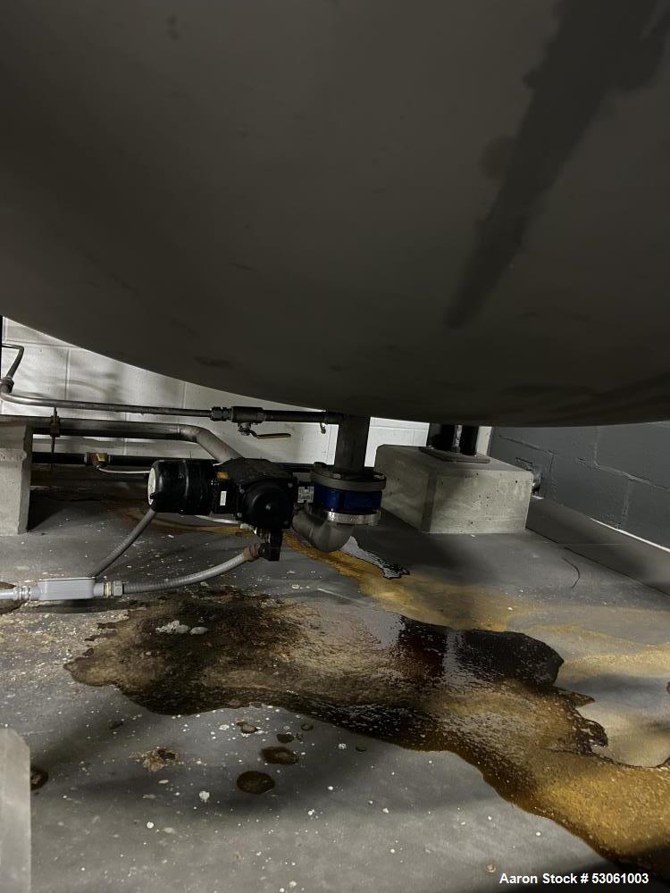 Used 3,000 Gallon Kennedy Holding Tank, Approx. 153" straight side, 84" diameter,Approx 183" overall height. Various top openings, 20" side bottom bolted manyway entrance, 3" center bottom outlet w/ ...