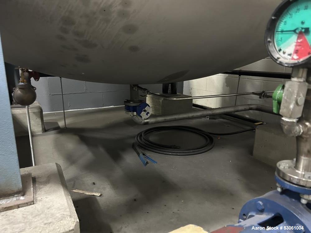 Used 3,000 Gallon Kennedy Holding Tank, Approx. 153" straight side, 84" diameter,Approx 183" overall height. Various top openings, 20" side bottom bolted manyway entrance, 3" center bottom outlet w/ ...