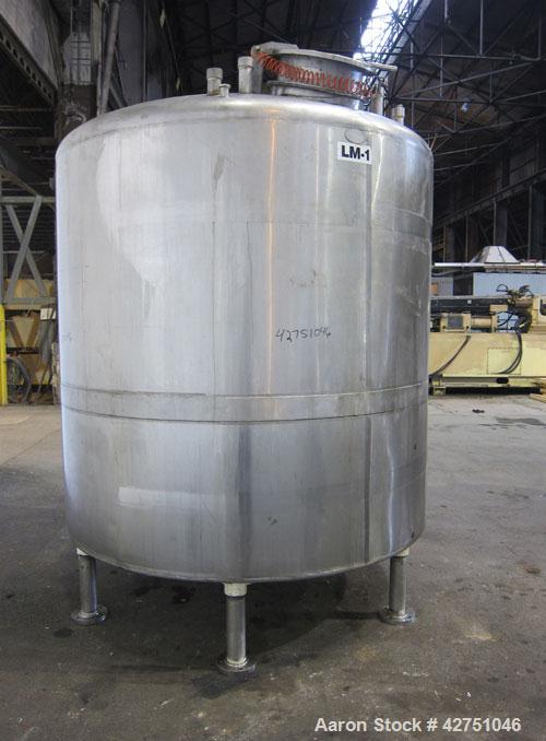 Used Langsenkamp Tank, 2000 Gallon, 304 Stainless Steel, Vertical. 84" Diameter x 78" straight side, dished top, coned bottom. Off center top entering Lightnin agitator, model N33G-90. 1-1/2" Diamete...