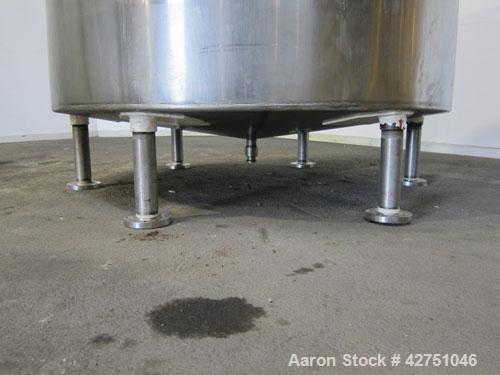 Used Langsenkamp Tank, 2000 Gallon, 304 Stainless Steel, Vertical. 84" Diameter x 78" straight side, dished top, coned bottom. Off center top entering Lightnin agitator, model N33G-90. 1-1/2" Diamete...