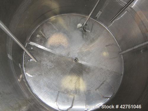 Used Langsenkamp Tank, 2000 Gallon, 304 Stainless Steel, Vertical. 84" Diameter x 78" straight side, dished top, coned bottom. Off center top entering Lightnin agitator, model N33G-90. 1-1/2" Diamete...