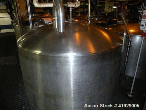 Used Lee Industries Tank, 2000 Gallon, model DBTT, stainless steel, vertical. 76" diameter x 106" straight side, dished top and bottom. Openings: top 3" tri-clamp, 4" tri-clamp, 4" vent, 24" manway w...