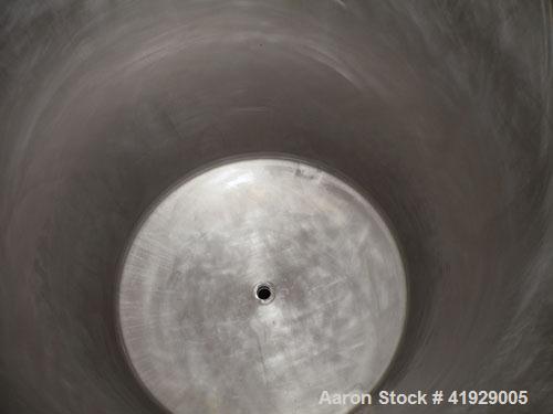 Used Lee Industries Tank, 2000 Gallon, model DBTT, stainless steel, vertical. 76" diameter x 106" straight side, dished top and bottom. Openings: top 3" tri-clamp, 4" tri-clamp, 4" vent, 24" manway w...