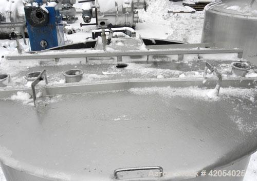Used Lee Metal Products Tank, 1000 Gallon, Model 1000A, 316 Stainless Steel, Vertical. 72" diameter x 72" deep. Open top 1/3 hinged cover, hemispherical bottom.(2) 3" off center bottom outlets, (1) 4...