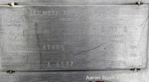 Used Lee Metal Products Tank, 1000 Gallon, Model 1000A, 316 Stainless Steel, Vertical. 72" diameter x 72" deep. Open top 1/3 hinged cover, hemispherical bottom.(2) 3" off center bottom outlets, (1) 4...