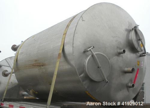 Used Lee Metal Products Tank, 1910 Gallon, 316 Stainless Steel, Vertical. 76" Diameter x 108" straight side, slight dish top, dished bottom. Openings: top (2) 18" manways with covers, (2) 3" sanitary...