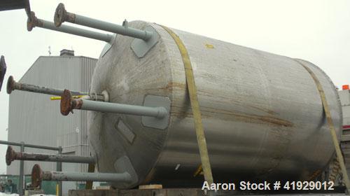 Used Lee Metal Products Tank, 1910 Gallon, 316 Stainless Steel, Vertical. 76" Diameter x 108" straight side, slight dish top, dished bottom. Openings: top (2) 18" manways with covers, (2) 3" sanitary...